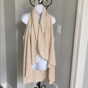 Adorable long shrug with arm holes